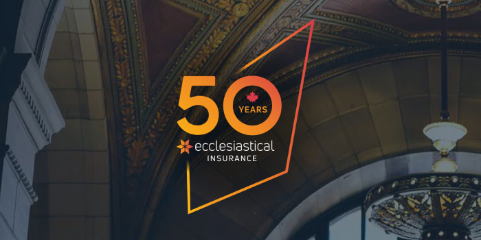 Ecclesiastical's 50th anniversary emblem on a dark background