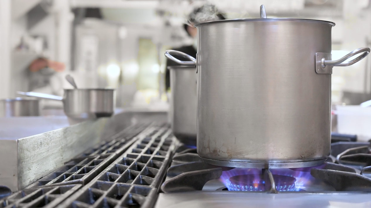 Close up of a stock pot on a stovetop