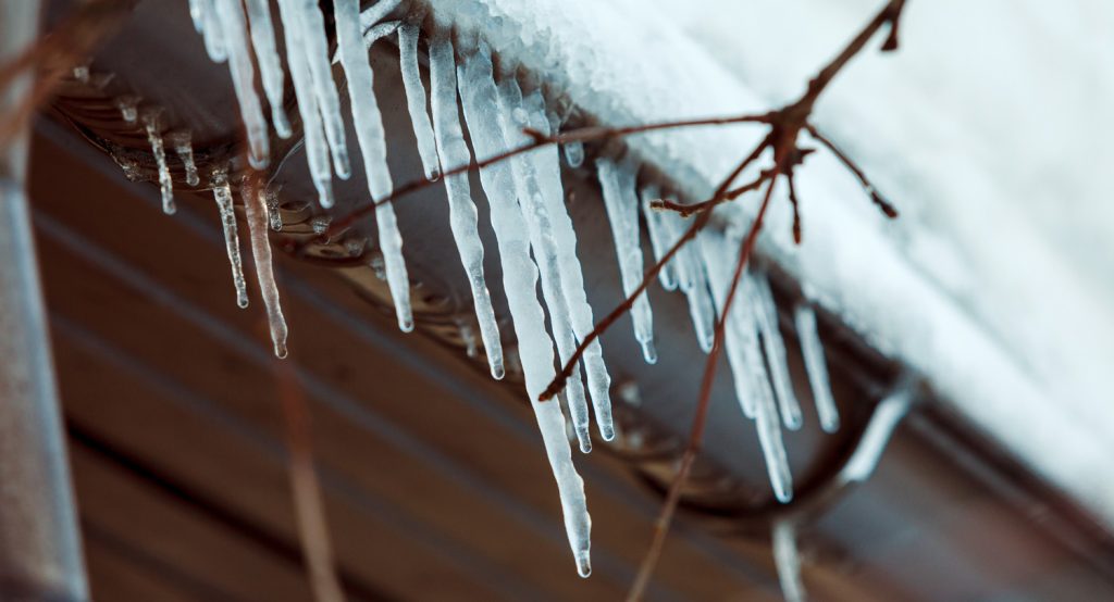 Close up of icicles on a roof