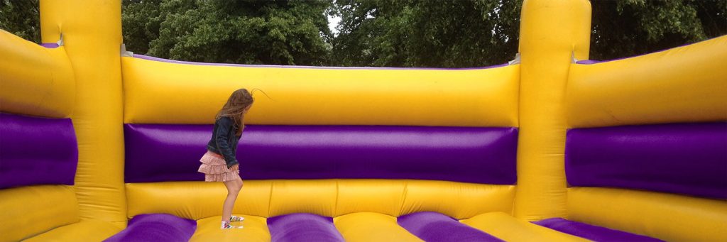 Child on bouncy castle