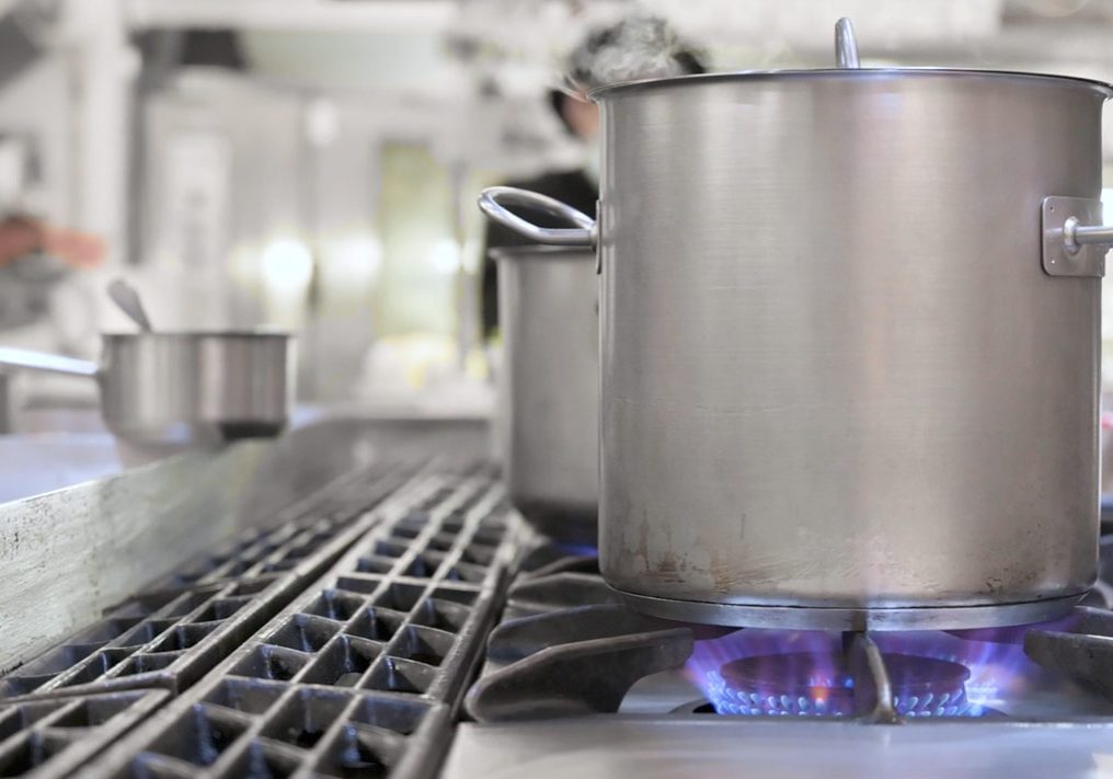 Close up of a stock pot on a stovetop